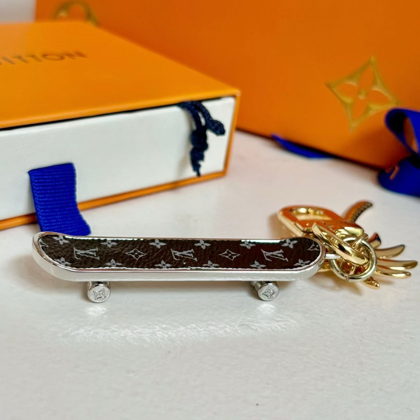 Louis Vuitton Monogram World Tour Bag Charm Tropical Palm Design with Gold Hardware