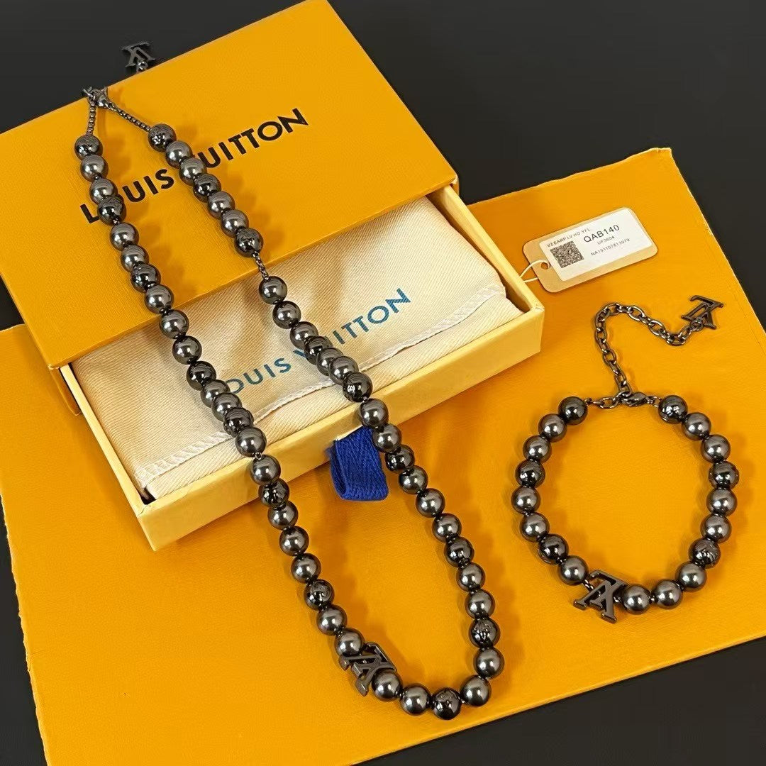 Louis Vuitton Metallic Bead Jewelry Set – Necklace & Bracelet with Signature LV Logo