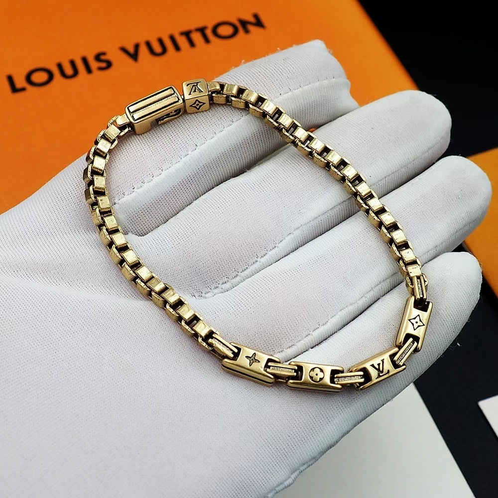 Louis Vuitton Gold Chain Bracelet – Monogram Engraving & Signature Clasp