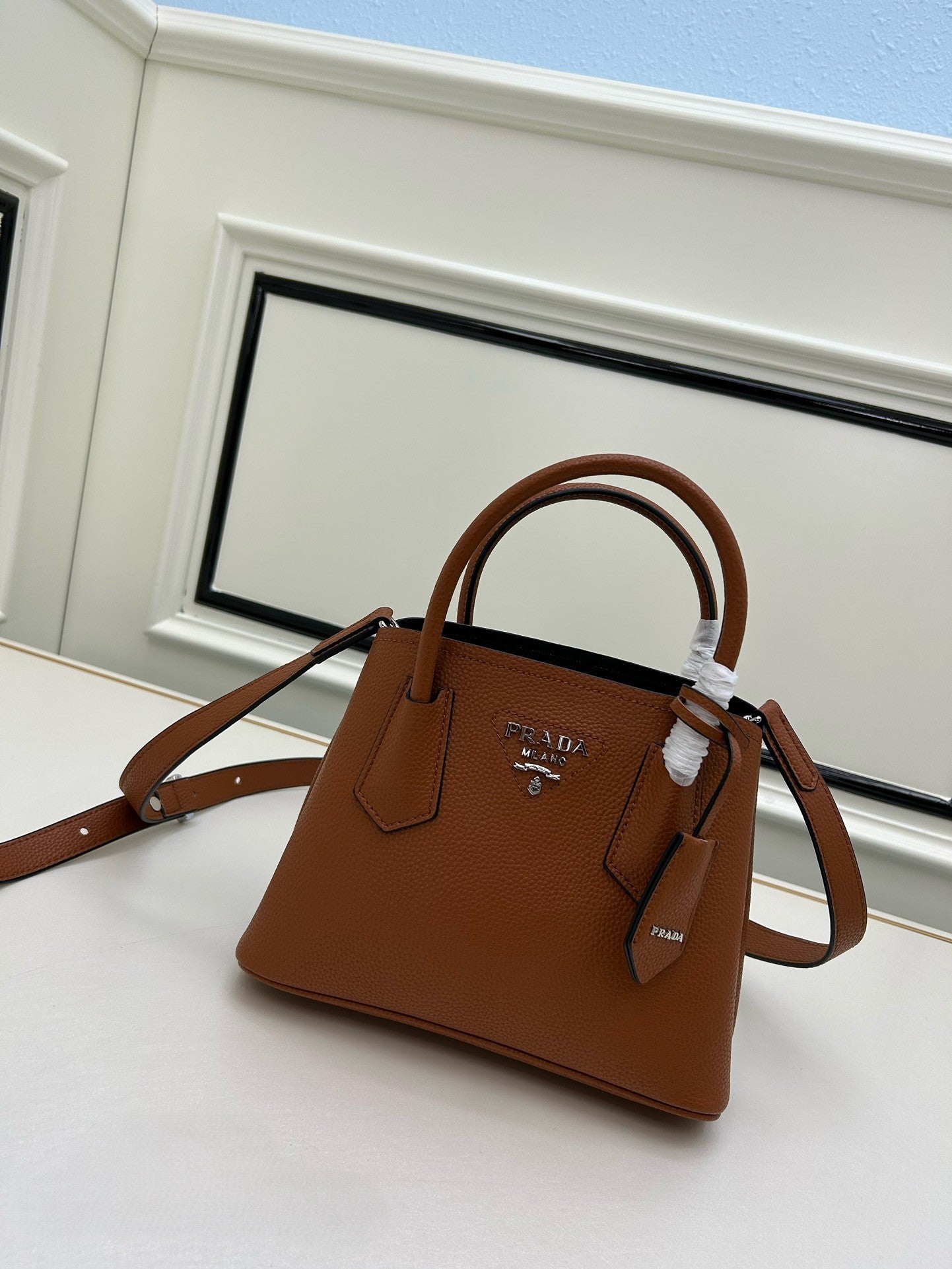 Prada Structured Leather Handbag – Black with Silver Logo & Dual Handles