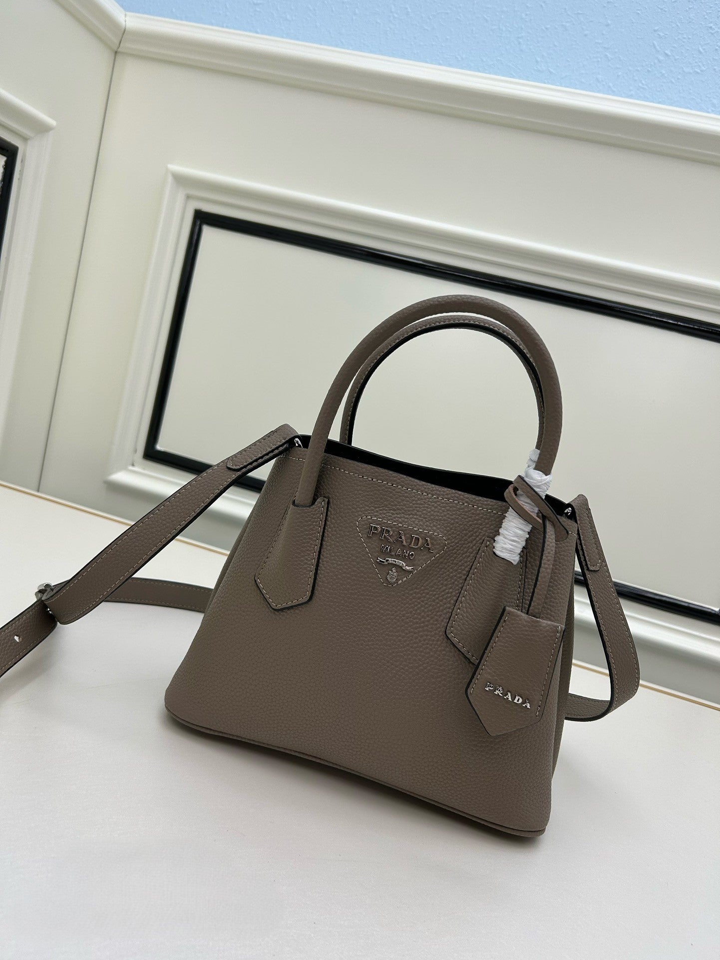 Prada Structured Leather Handbag – Black with Silver Logo & Dual Handles