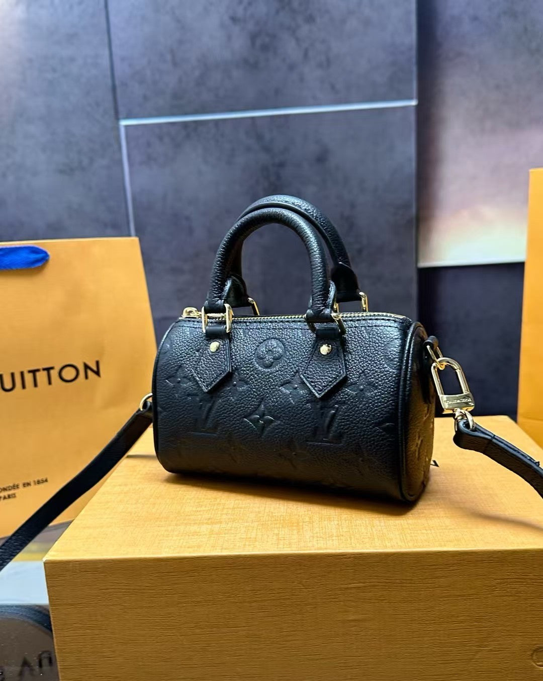 Louis Vuitton Mini Handbag – Black Embossed Monogram with Gold Hardware