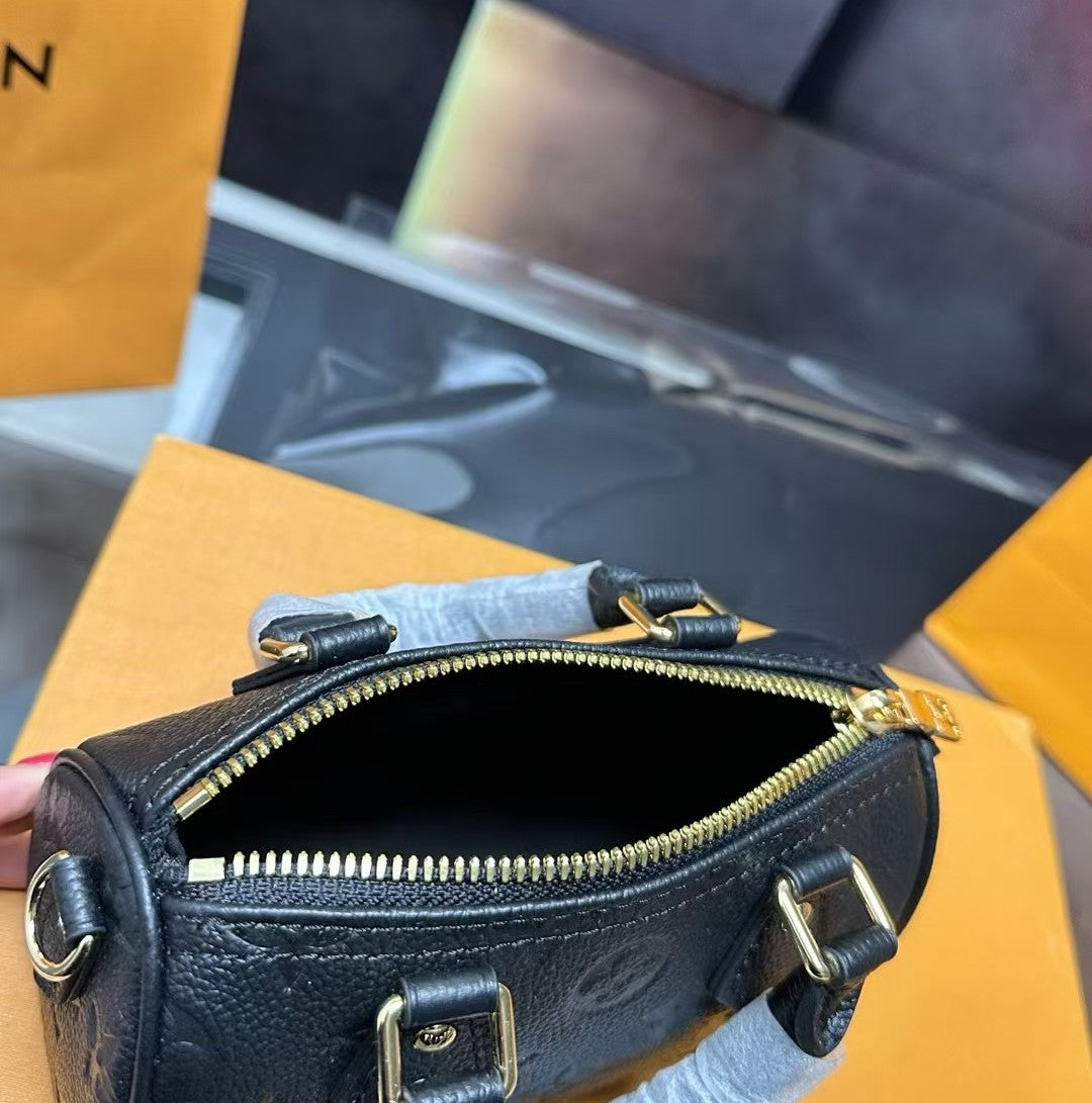Louis Vuitton Mini Handbag – Black Embossed Monogram with Gold Hardware