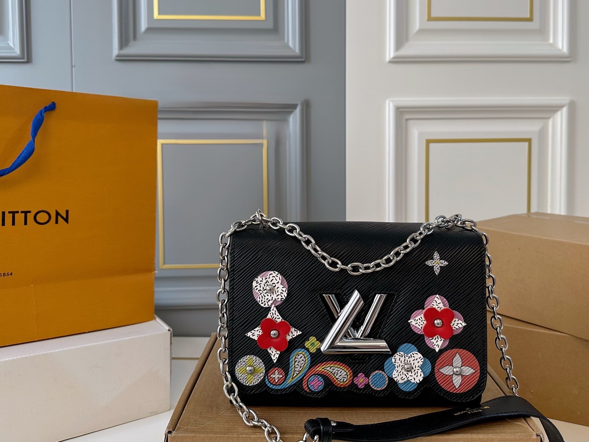 Louis Vuitton Twist Handbag – Colorful Embellished Edition with Silver Chain Strap