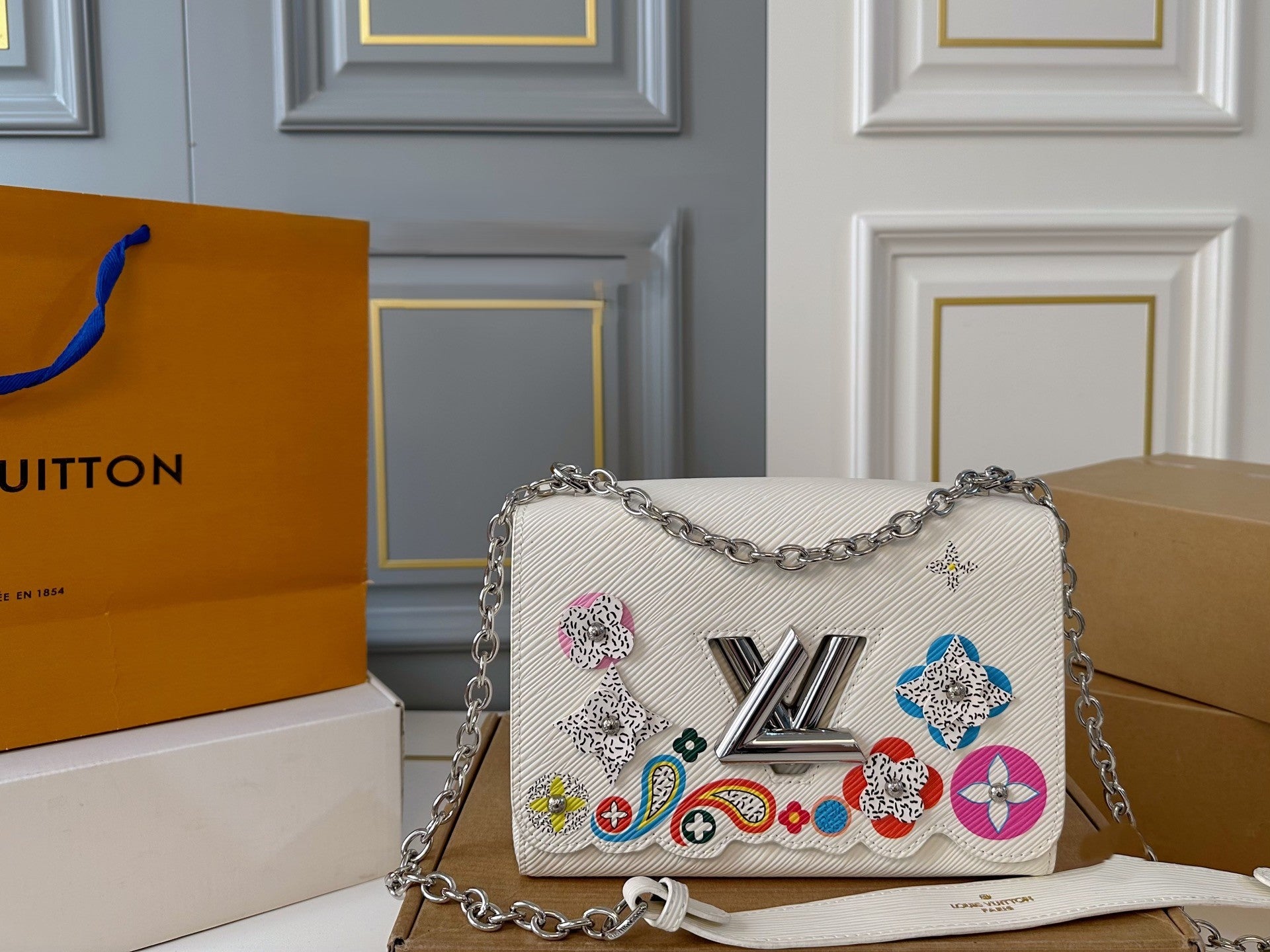 Louis Vuitton Twist Handbag – Colorful Embellished Edition with Silver Chain Strap
