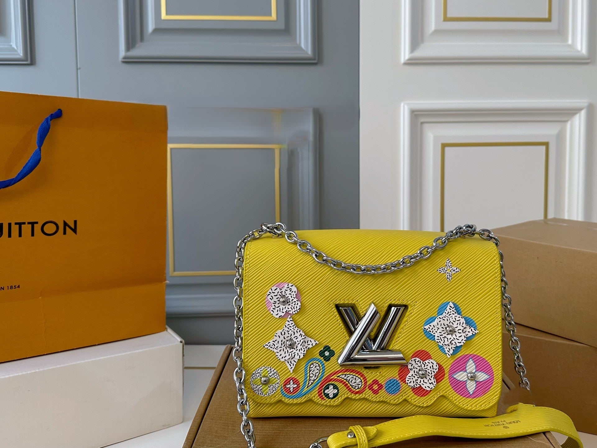 Louis Vuitton Twist Handbag – Colorful Embellished Edition with Silver Chain Strap