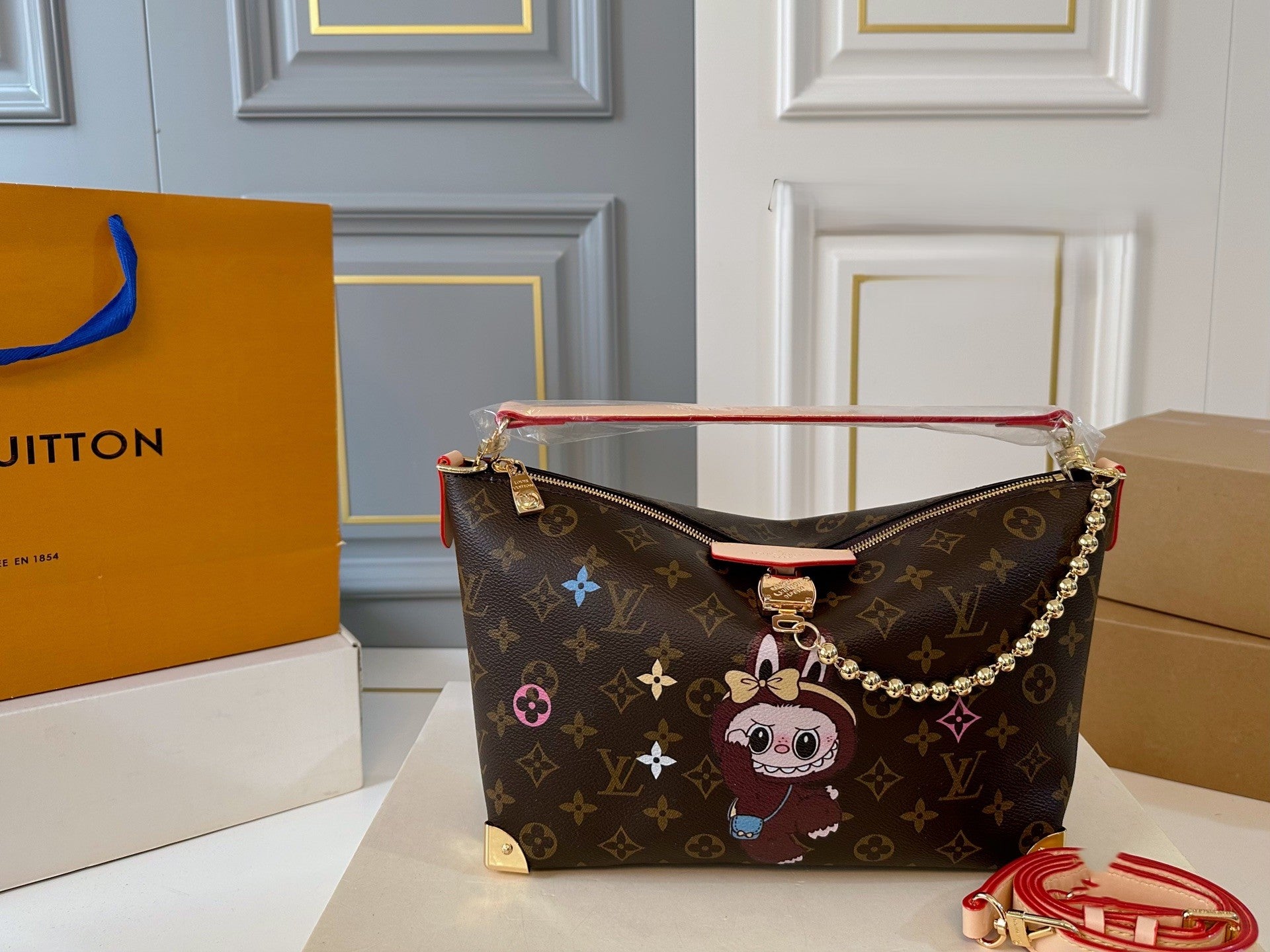 Louis Vuitton x Labubu Crossbody Bag – Vintage Monogram with Character Patch & Pearl Chain