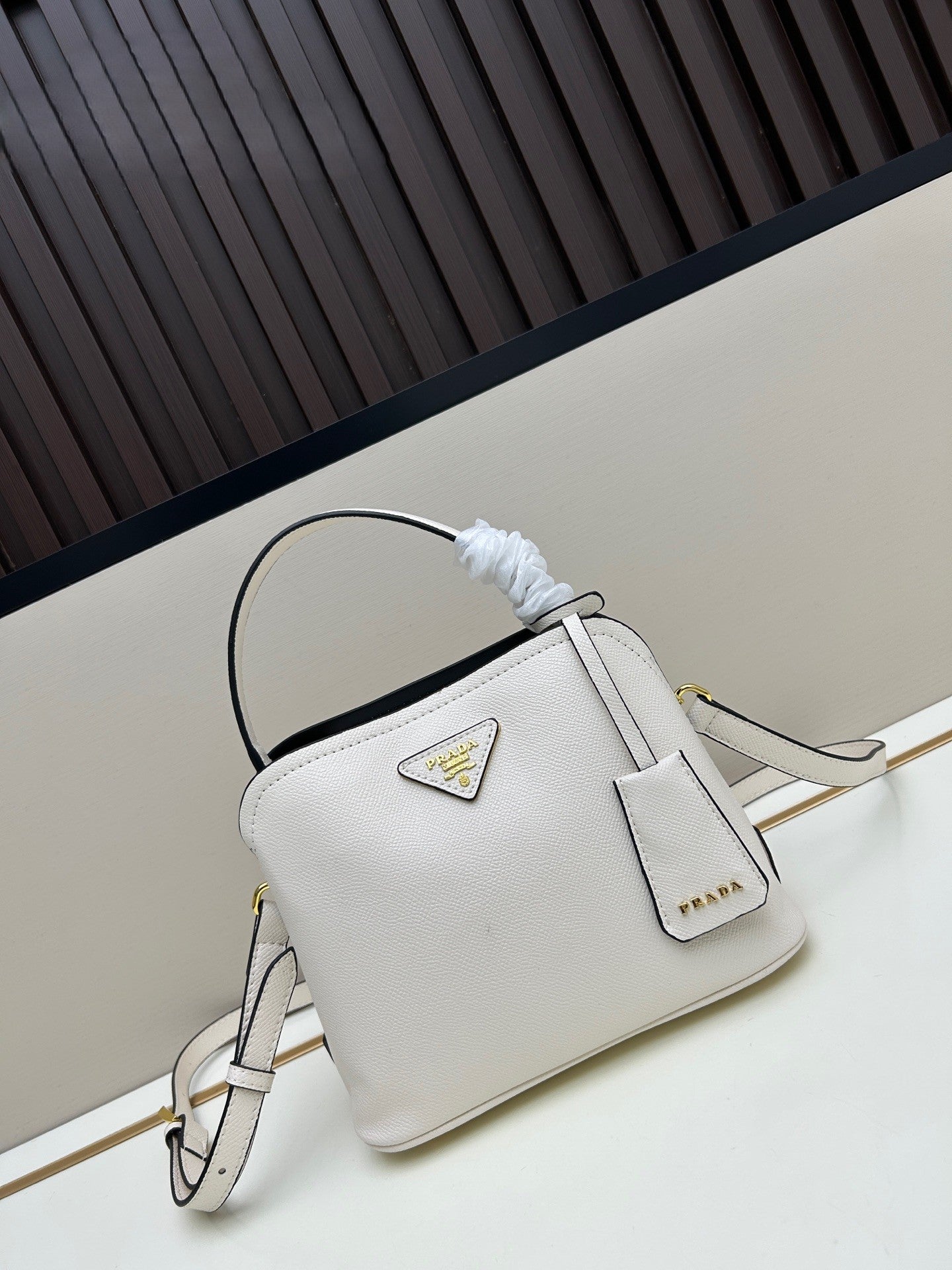 Prada Structured Handbag – Black with Gold Logo Plaque & Top Handle