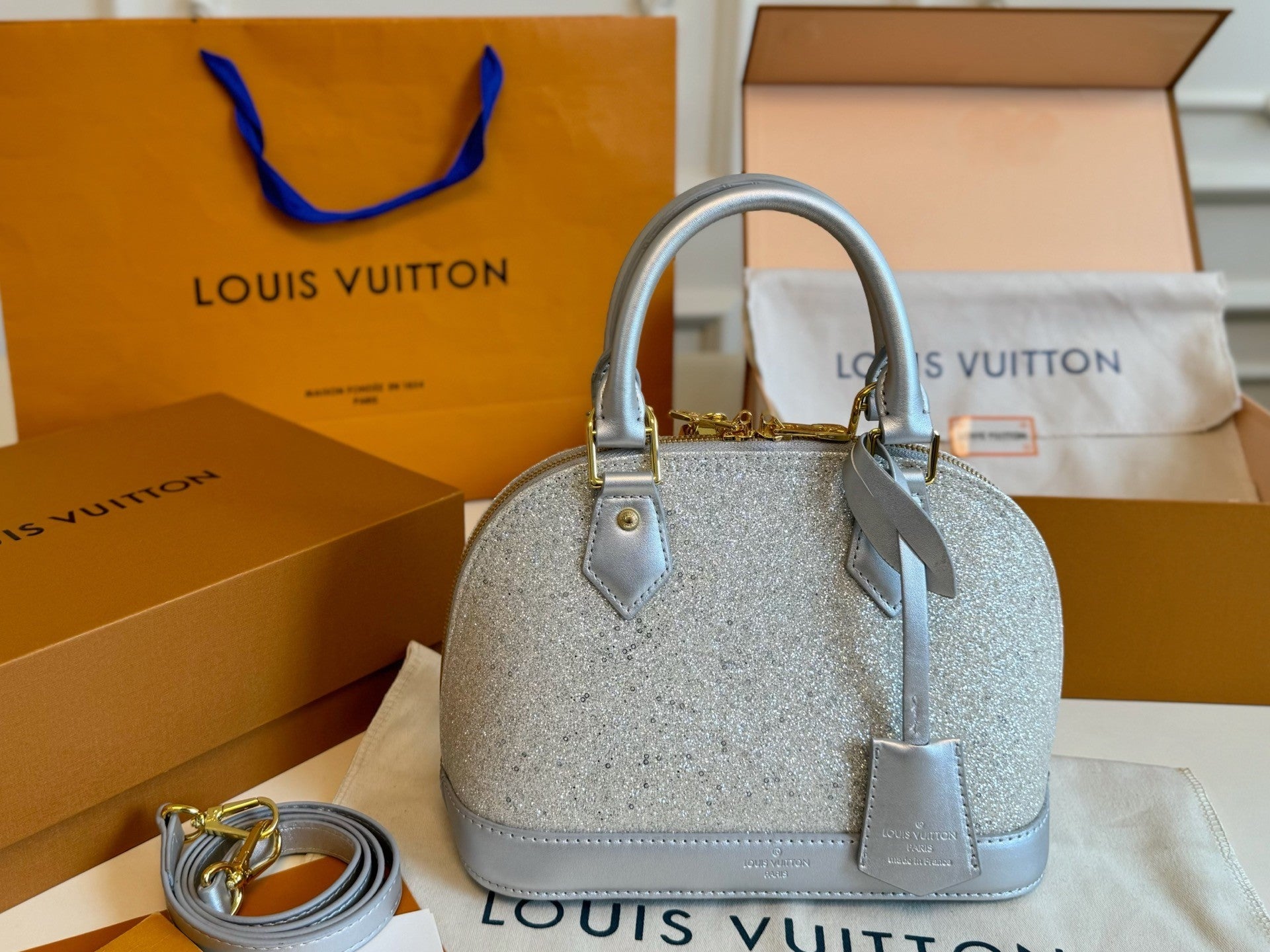 Louis Vuitton Glitter Dome Handbag – Structured Design with Gold Hardware & Color Accents