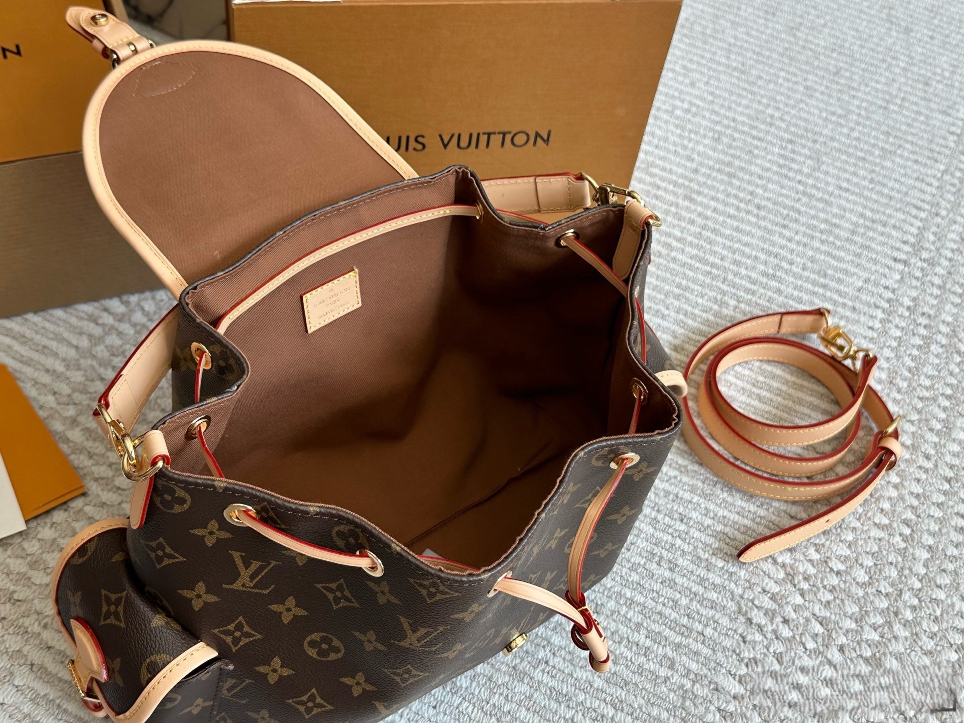 Louis Vuitton Monogram Drawstring Handbag – Buckle Flap Design