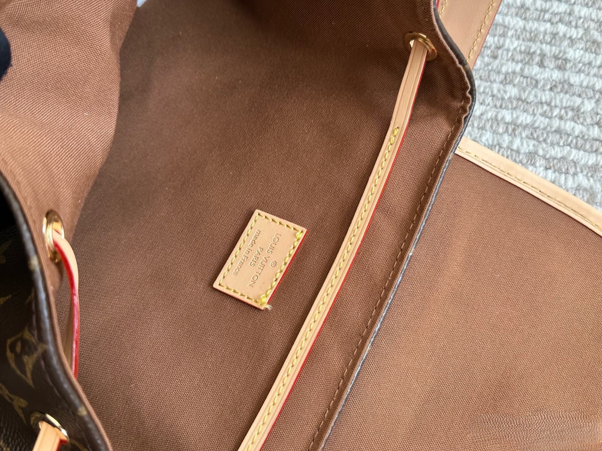Louis Vuitton Monogram Drawstring Handbag – Buckle Flap Design