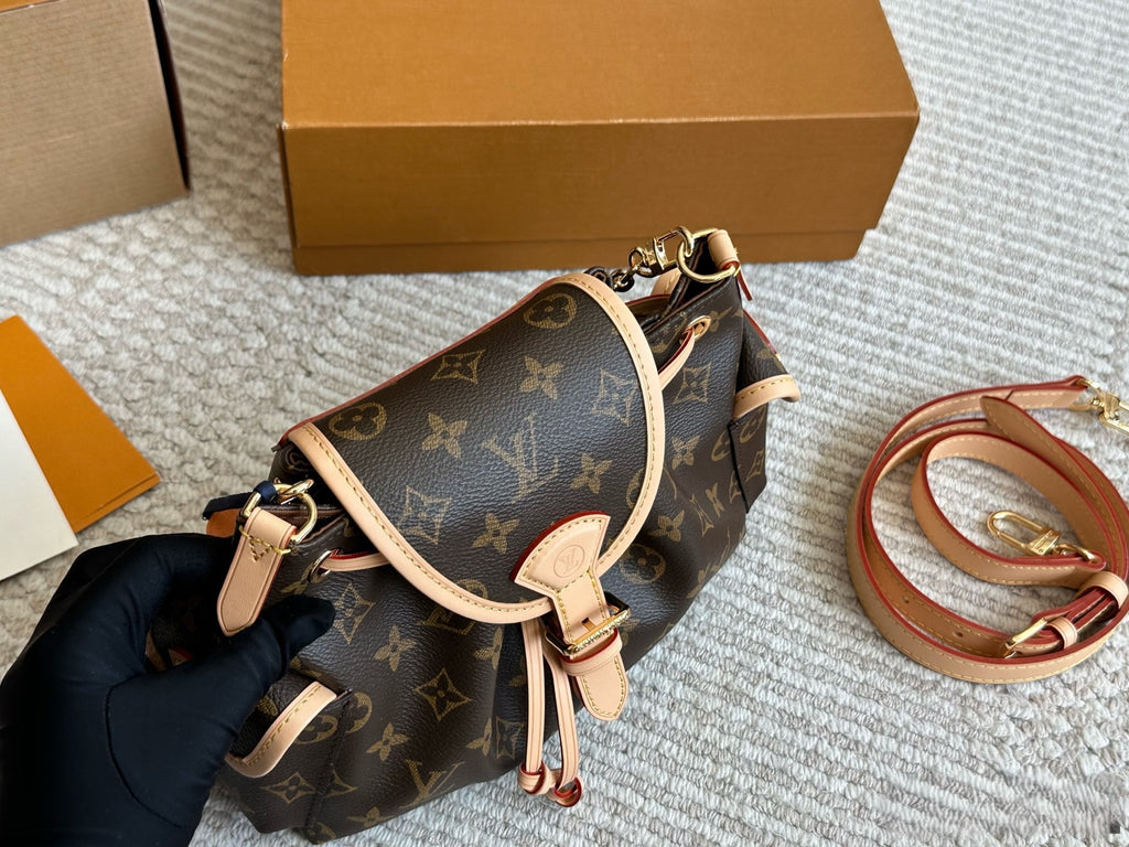 Louis Vuitton Drawstring Flap Handbag with Gold Hardware