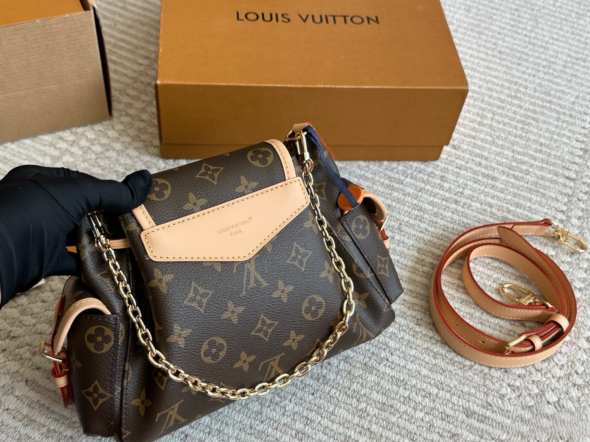 Louis Vuitton Drawstring Flap Handbag with Gold Hardware