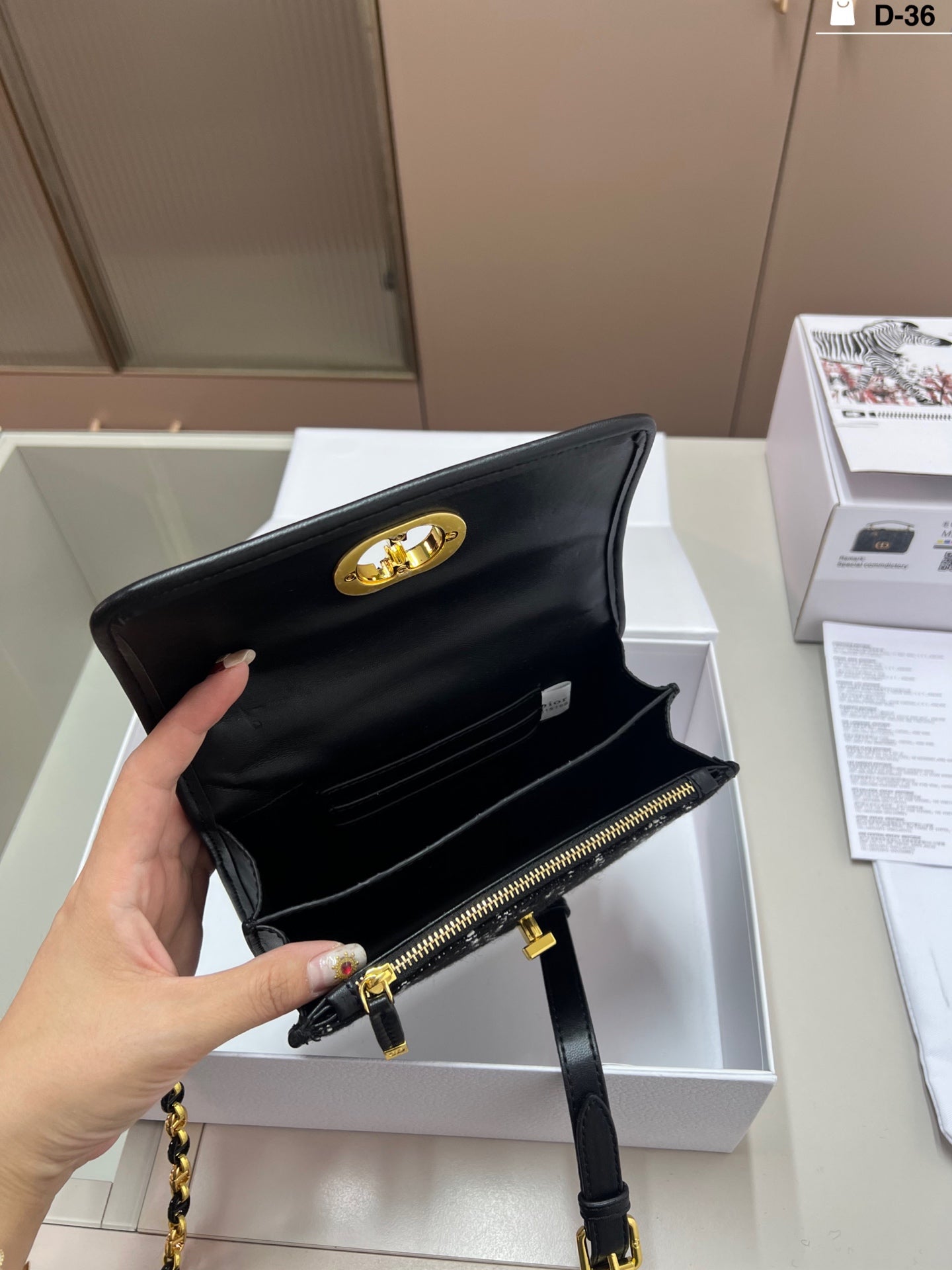 Dior Sparkle Chain Clutch – Black with Gold CD Clasp and Leather-Threaded Strap