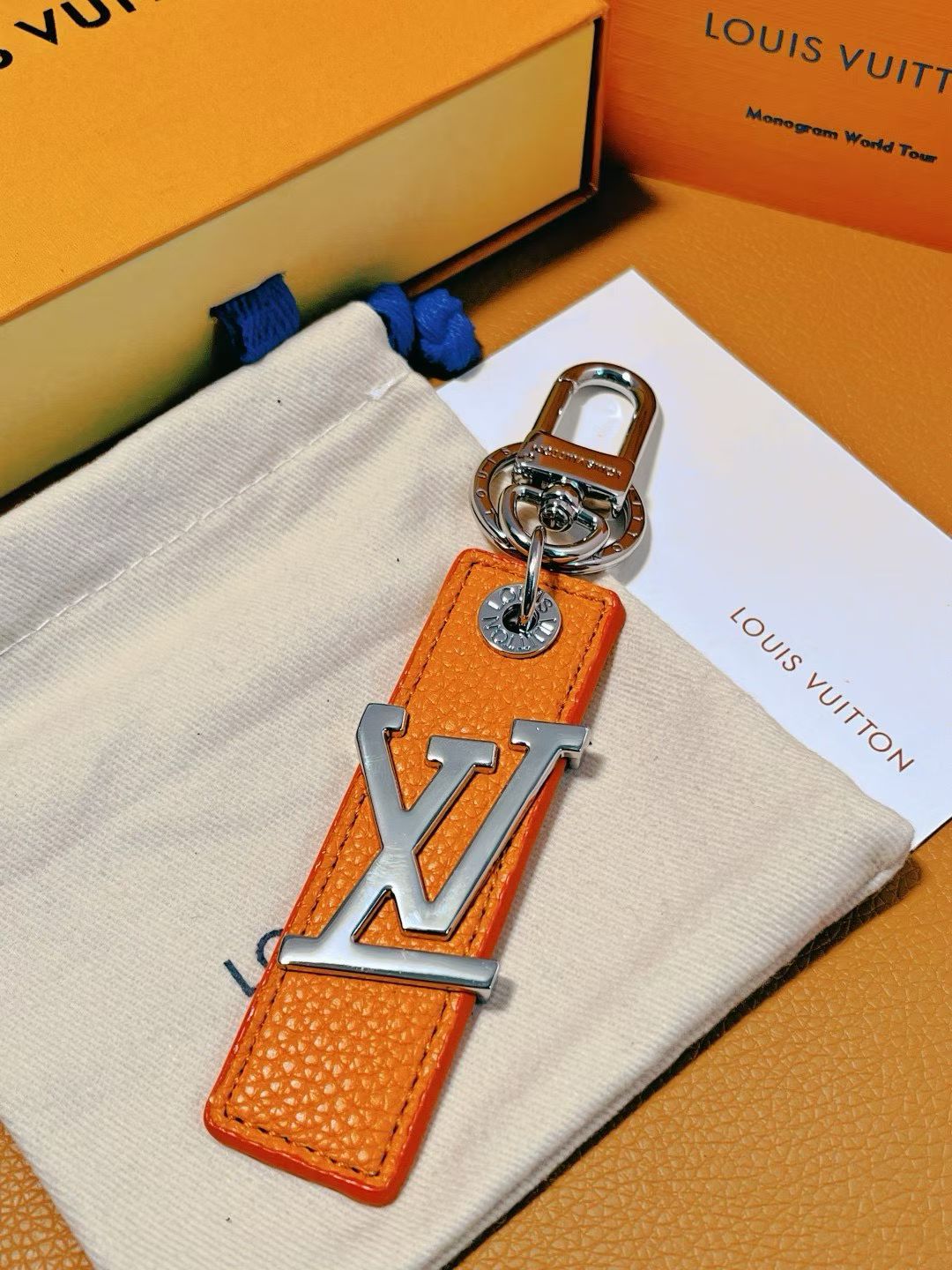 Louis Vuitton LV Logo Keychain – Colorful Leather Strap with Silver Hardware